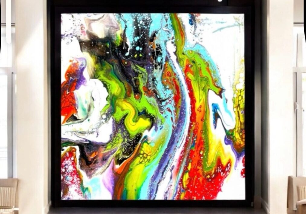 A large painting of colorful swirls and colors
